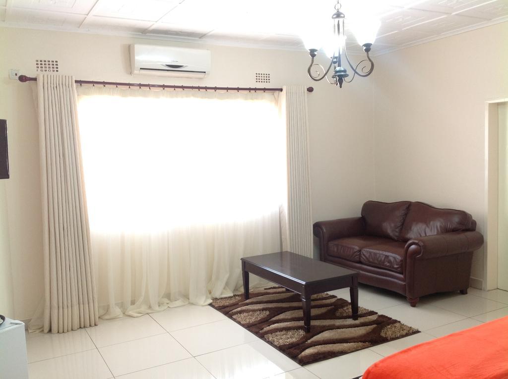 Cypress Executive Lodge Ливингстън Стая снимка